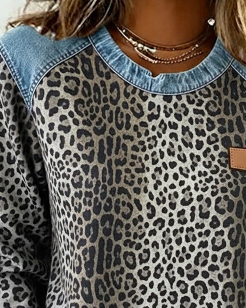 Sudadera para mujer con estampado de leopardo y detalles vaqueros