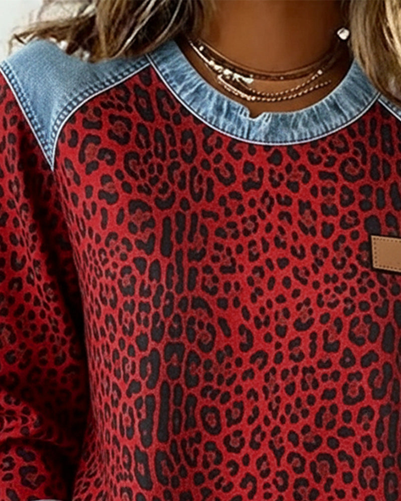 Sudadera para mujer con estampado de leopardo y detalles vaqueros