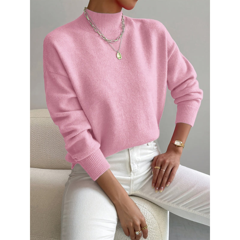 Jersey de punto liso con cuello alto para mujer en rosa claro – vista frontal