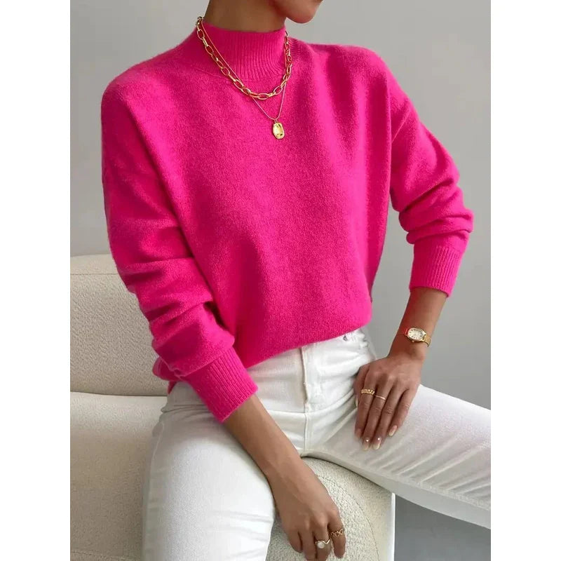 Jersey de punto liso con cuello alto para mujer en fucsia – vista frontal