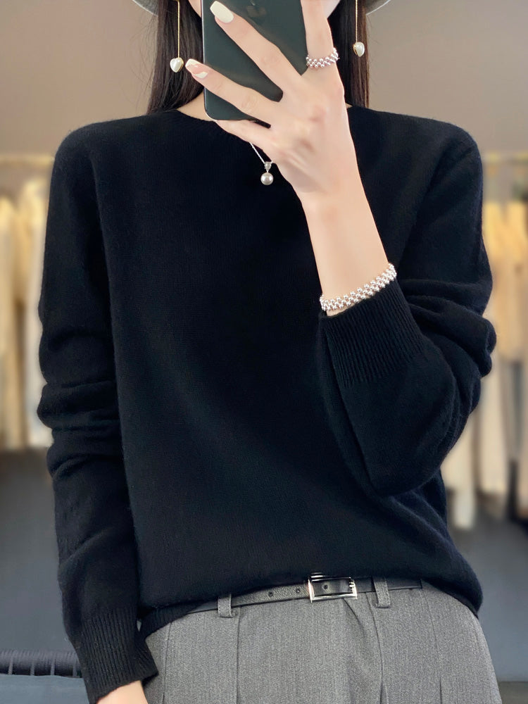 Jersey de punto liso para mujer con cuello redondo en color negro