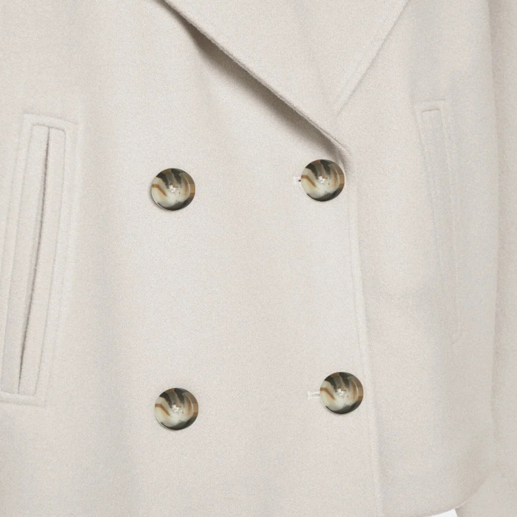 Chaqueta corta para mujer con doble botonadura